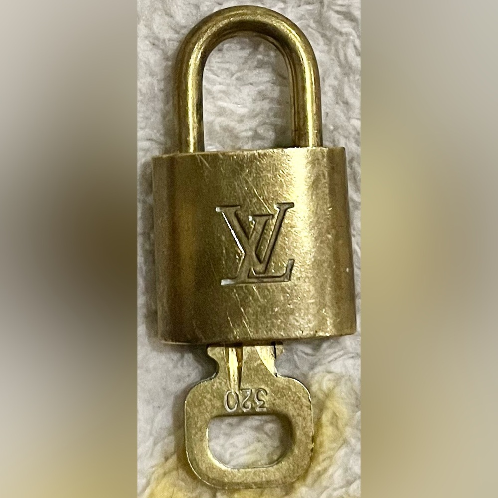Louis Vuitton padlock and key